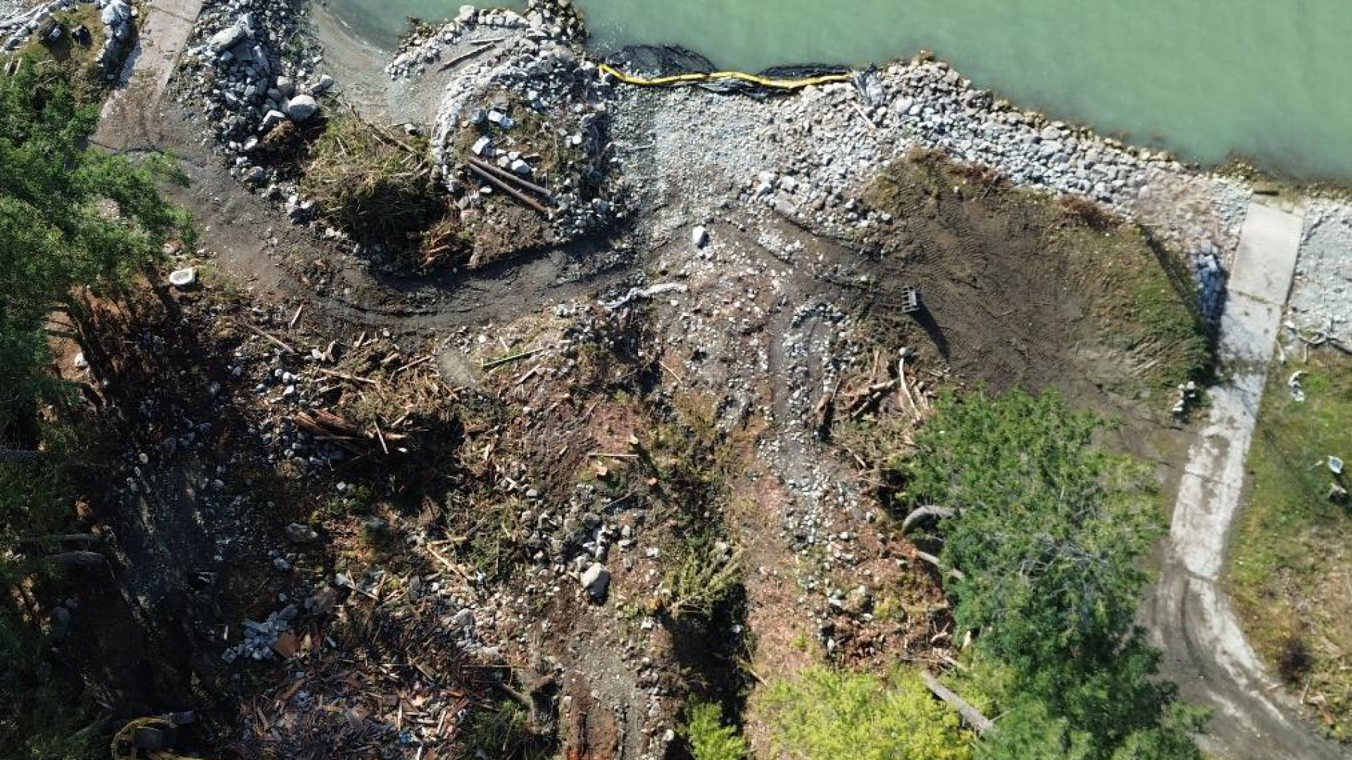 Mouth of creek, showing silt curtain, common lot boat ramps, tree clearing. November 30 2025 (LLE)